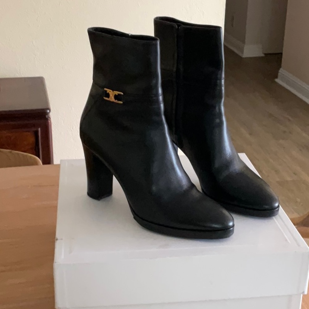 Celine Claude black leather heeled boots with gold detail